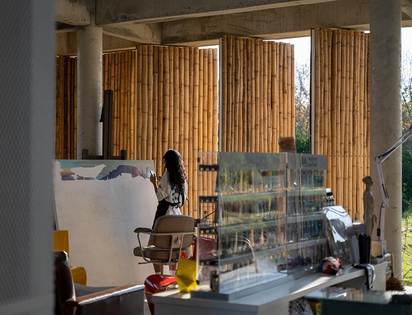 bamboo battens and discarded concrete spacers envelope art studio by 11.29 studio in thailand