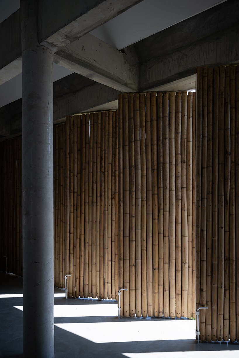 bamboo battens and discarded concrete spacers envelope art studio by 11.29 studio in thailand