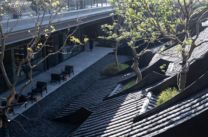 TROP 将绍兴古老的雨屋顶翻译成“别墅”