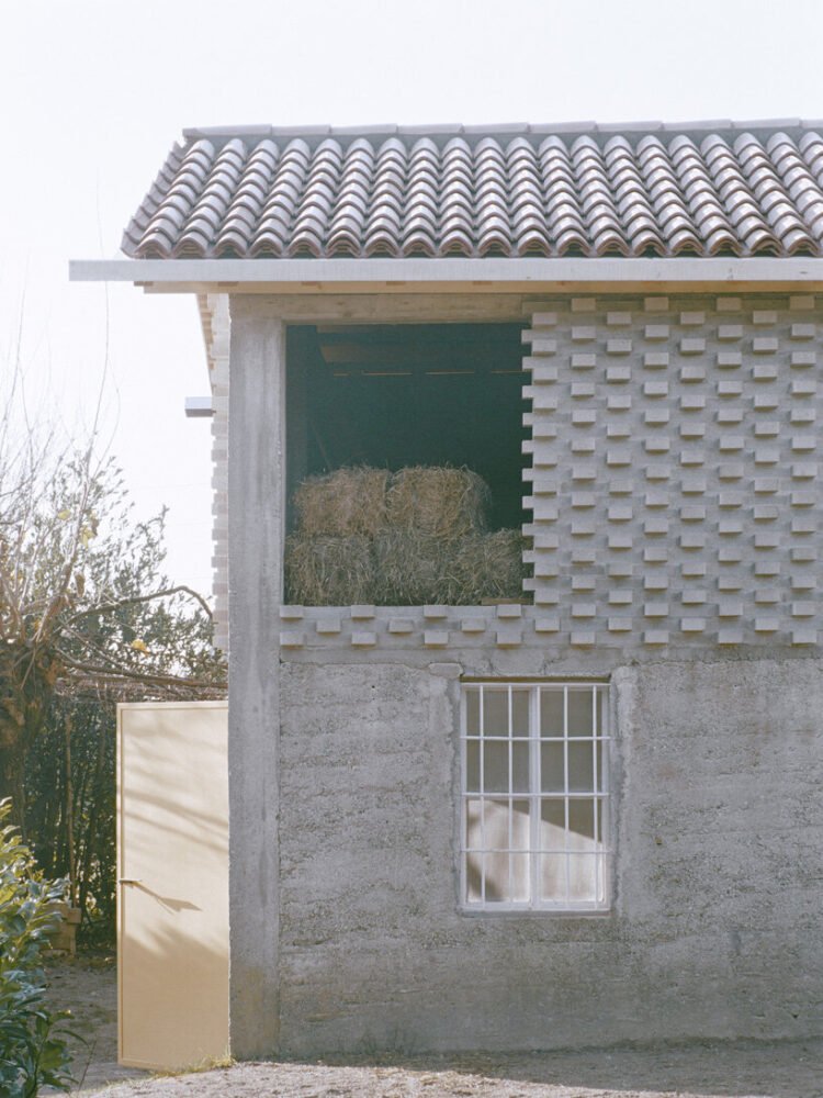 a25 architetti’s barn renovation in northern italy reinterprets tradition in a contemporary way