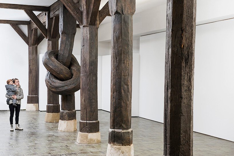 unzipping the ordinary: alex chinneck on bending reality through art, awe, and accessible experiences