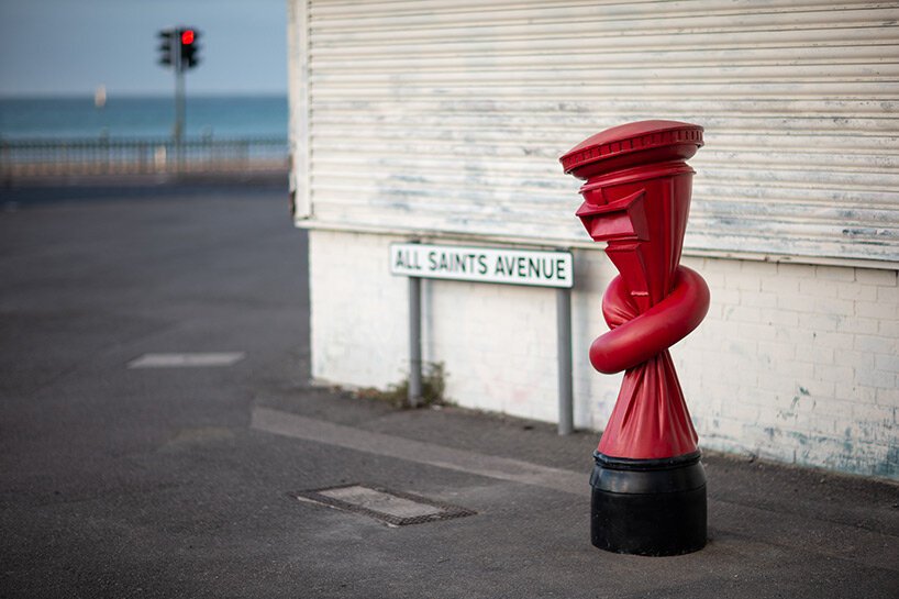 unzipping the ordinary: alex chinneck on bending reality through art, awe, and accessible experiences
