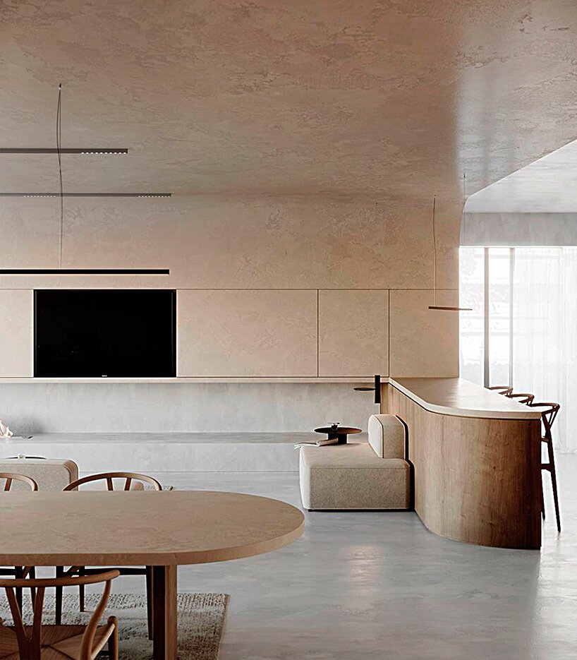 curved surfaces and warm tones give shape to this residential interior in greece by kordas architects