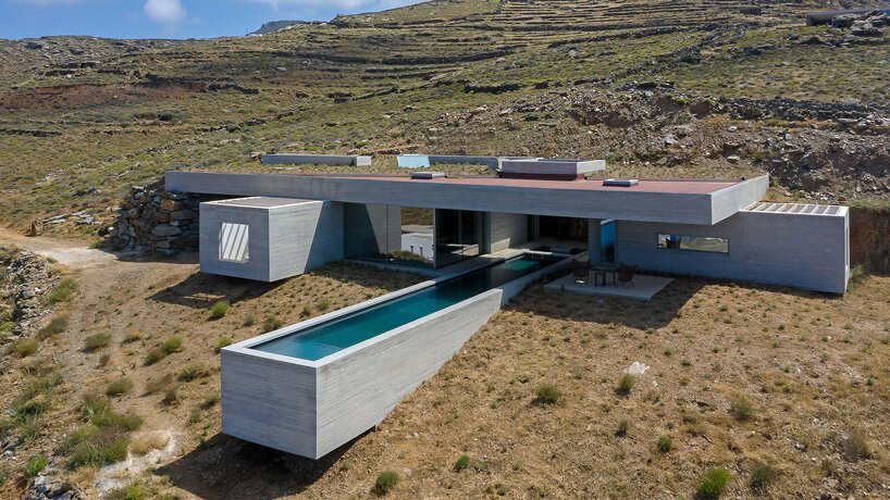 阿里斯蒂德斯达拉斯建筑师事务所将“游泳池别墅”融入蒂诺斯岛崎岖的景观中