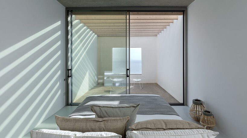 阿里斯蒂德斯达拉斯建筑师事务所将“游泳池别墅”融入蒂诺斯岛崎岖的景观中