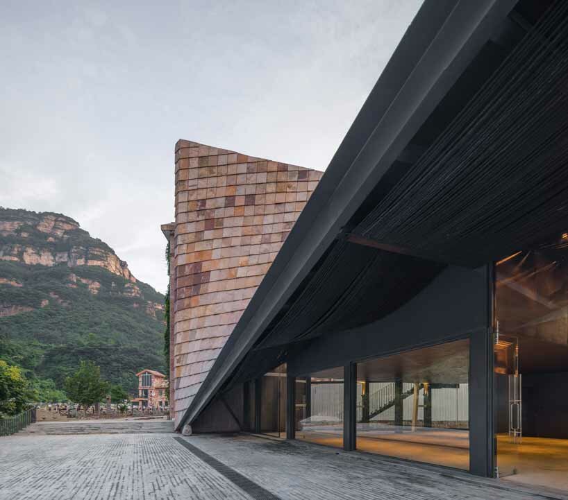 taihang xinyu art museum organically grows out of its rough terrain in rural china