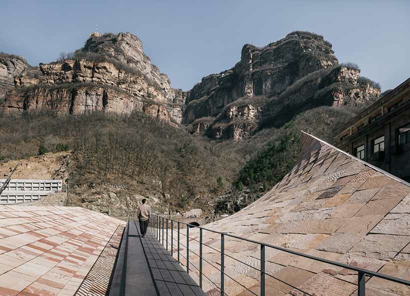 taihang xinyu art museum organically grows out of its rough terrain in rural china