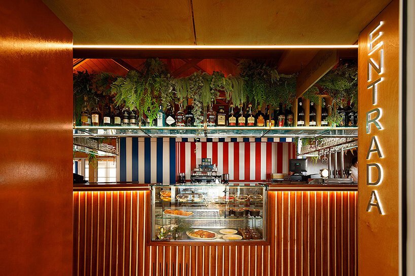 ferreira arquitectos 模仿条纹海滩帐篷修复葡萄牙的帆船俱乐部