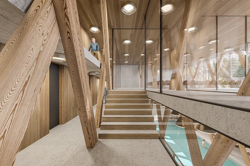 a stack of timber A-frames by enota architects to extend slovenia’s hotel natura