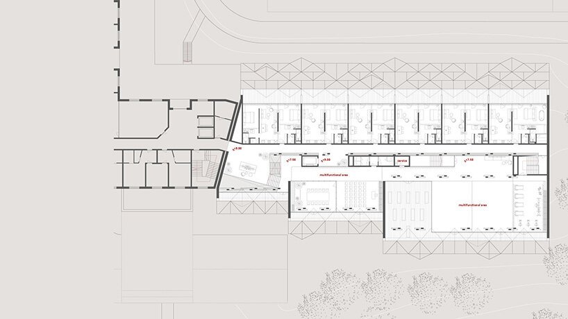 a stack of timber A-frames by enota architects to extend slovenia’s hotel natura