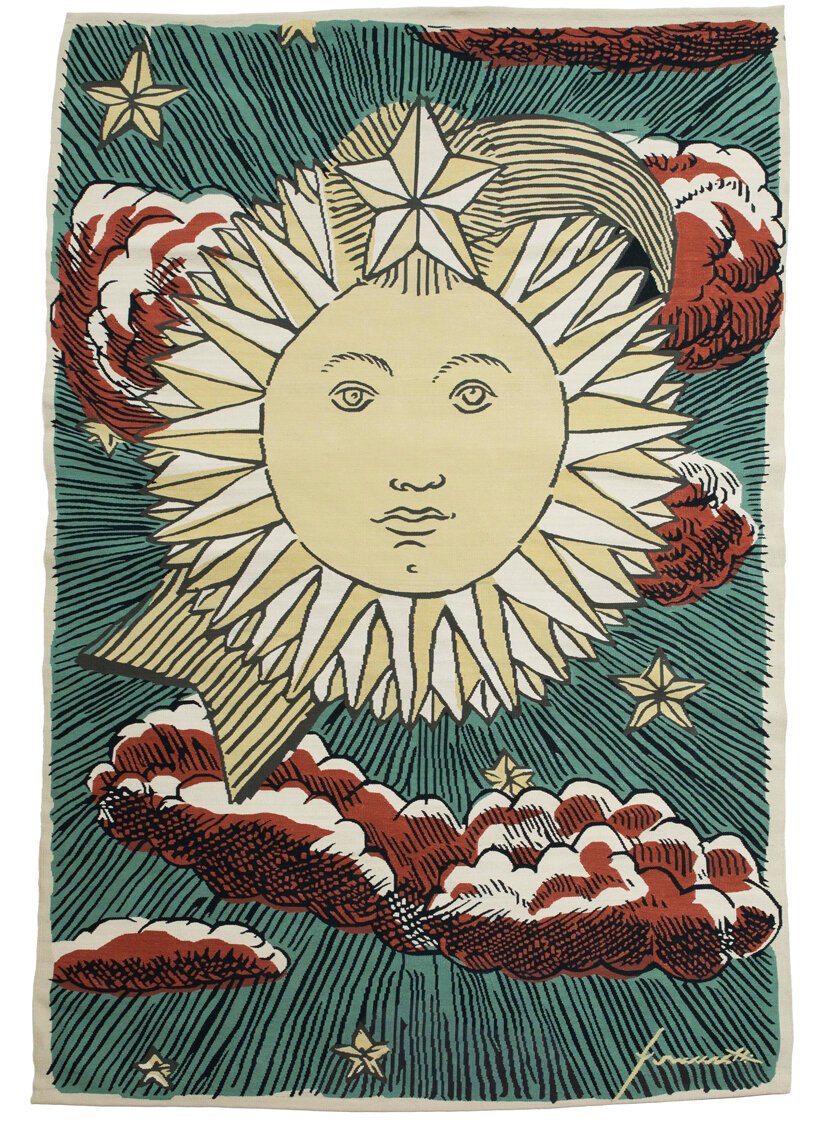 圣莫里茨 NOMAD 的 Fornasetti 手工编织挂毯上的太阳星星 圣莫里茨 NOMAD 的 Fornasetti 手工编织挂毯上的太阳星星