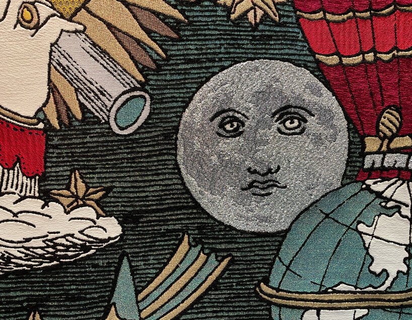 圣莫里茨 NOMAD 的 Fornasetti 手工编织挂毯上的太阳星星 圣莫里茨 NOMAD 的 Fornasetti 手工编织挂毯上的太阳星星