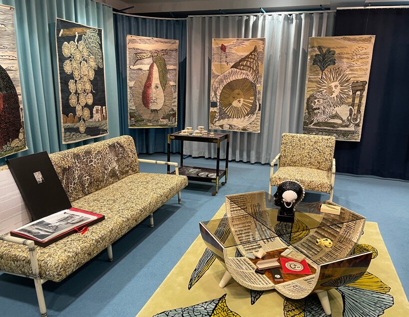 圣莫里茨 NOMAD 的 Fornasetti 手工编织挂毯上的太阳星星 圣莫里茨 NOMAD 的 Fornasetti 手工编织挂毯上的太阳星星