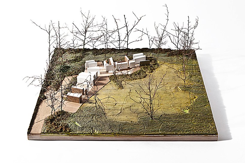 TANK 在法国北部的雕塑木屋顶下隐藏了“maison mouvaux” TANK 在法国北部的雕塑木屋顶下隐藏了“maison mouvaux”