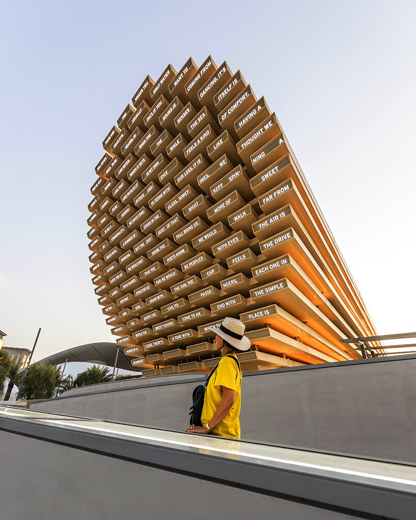 giant conical pavilion spells out poems with your contribution at expo 2020 dubai