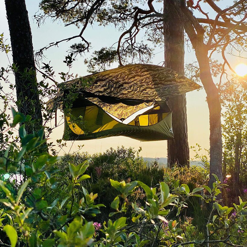 避风港帐篷将吊床和帐篷结合在一起，打造舒适的露营体验