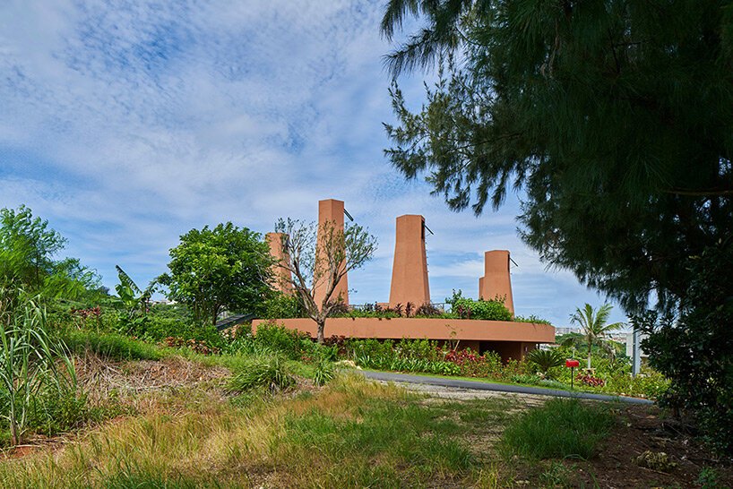 wind chimneys with glassless skylights illuminate care house by hiroshi nakamura & NAP in japan