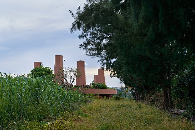 wind chimneys with glassless skylights illuminate care house by hiroshi nakamura & NAP in japan