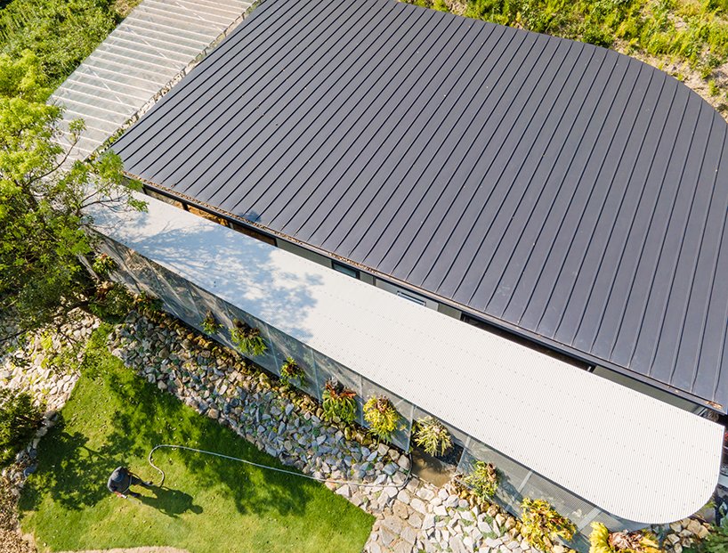 1-1 建筑师为日本爱知县的一位热带植物农民设计了一个家庭住宅