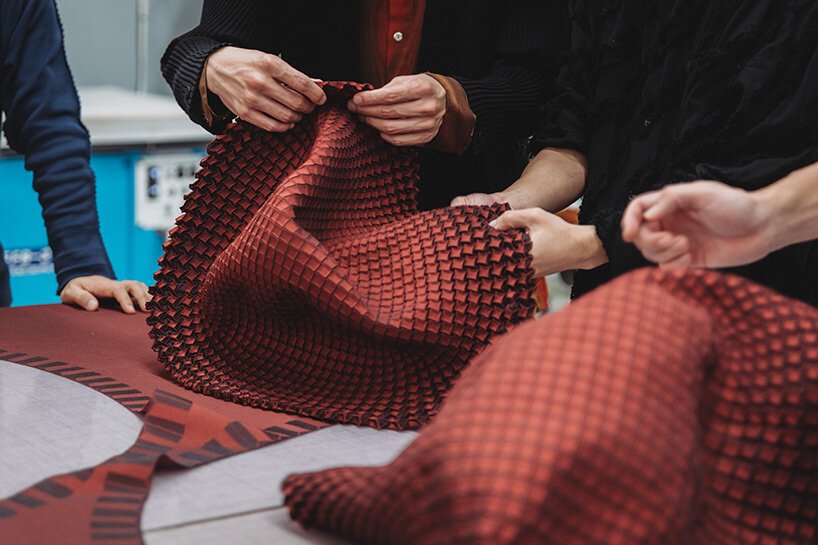 issey miyake & nature architects model fabric that takes 3D weave pattern when steamed