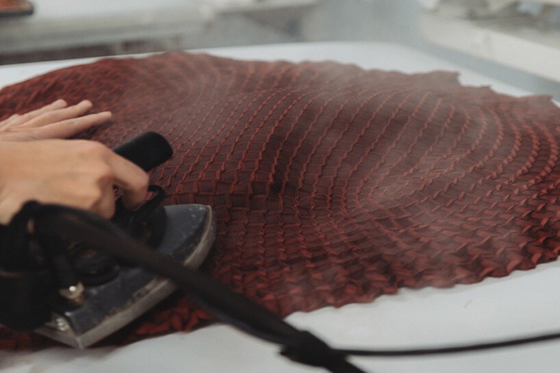 issey miyake & nature architects model fabric that takes 3D weave pattern when steamed