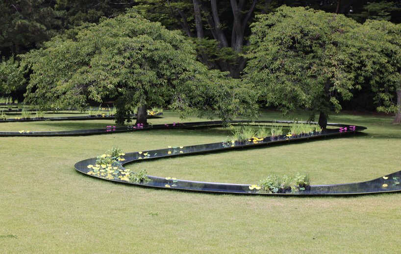 妹岛和世的弧形水亭流经东京滨离宫花园