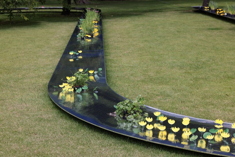 妹岛和世的弧形水亭流经东京滨离宫花园