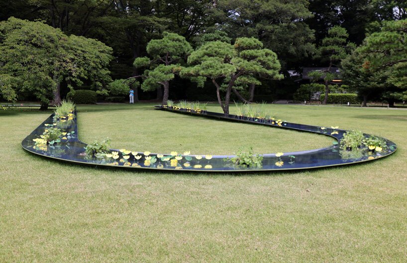 妹岛和世的弧形水亭流经东京滨离宫花园