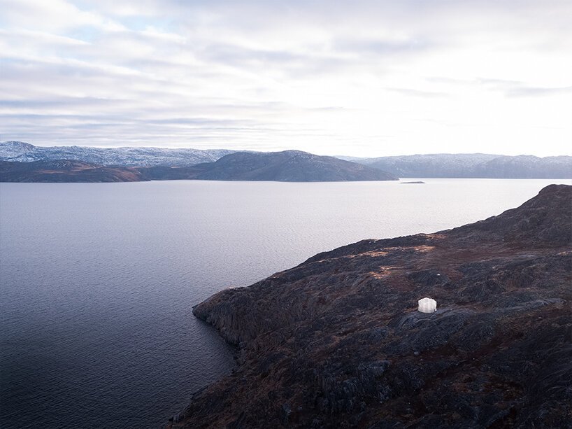 konstantin ikonomidis camouflages transparent pavilion in its greenlandic surrounding