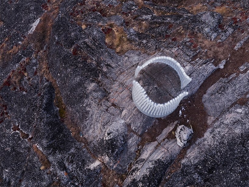 vanishing into the surrounding topography