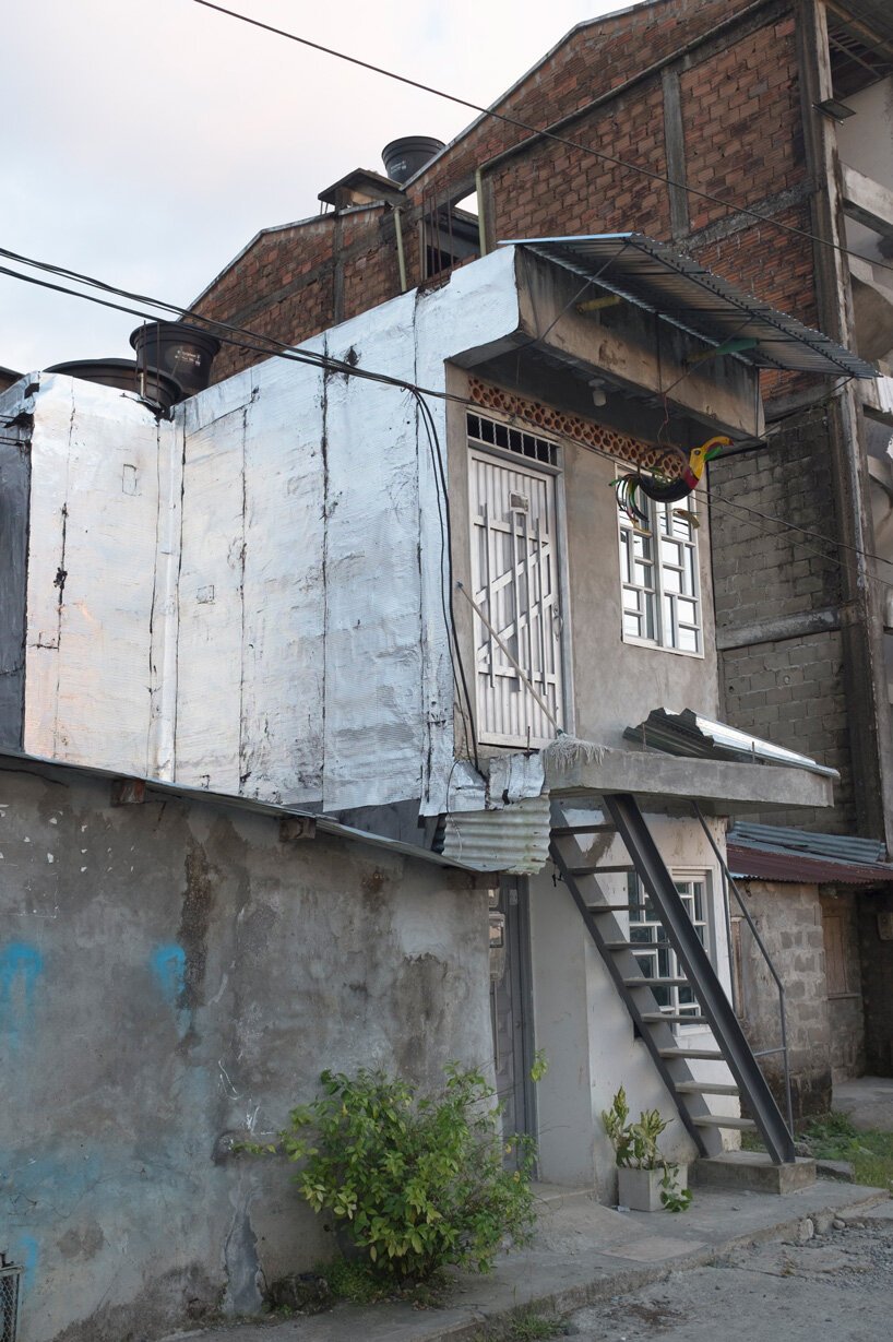 库尔特·霍兰德 (kurt Hollander) 捕捉哥伦比亚雨林城市基布多闪闪发光的建筑