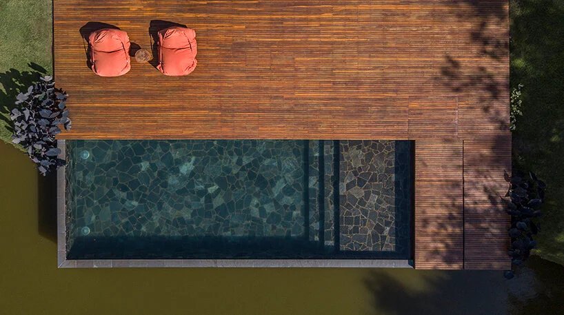 可操作的立面为 mf+arquitetos 设计的这座混凝土住宅带来了轻盈感和多孔性