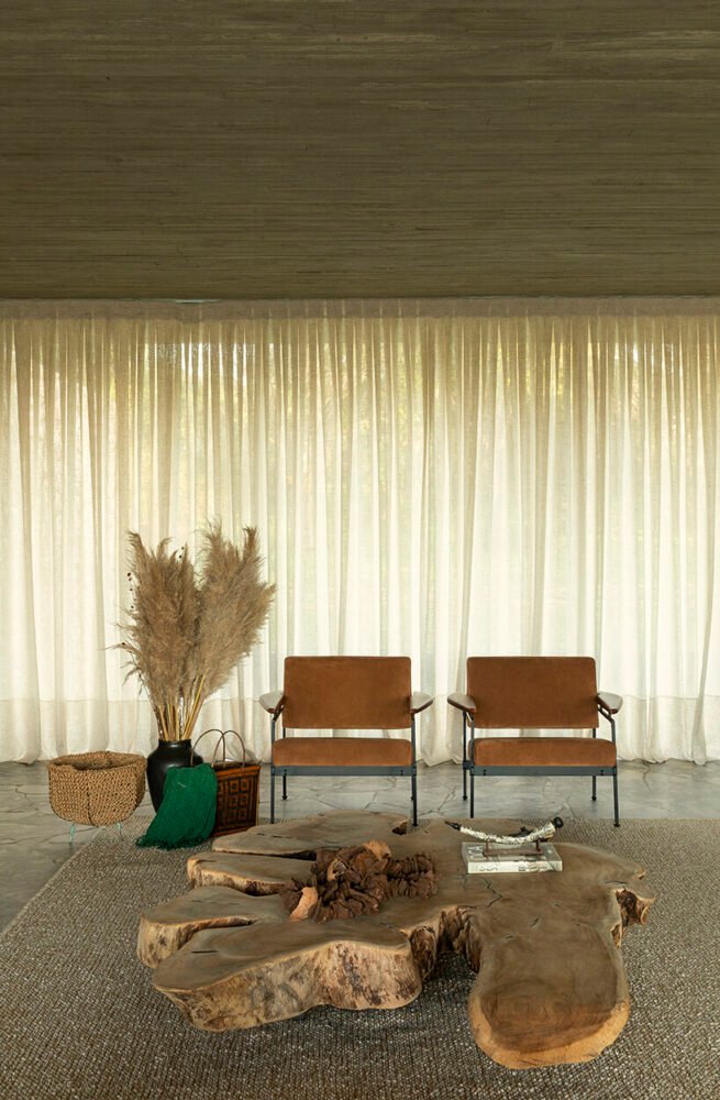 可操作的立面为 mf+arquitetos 设计的这座混凝土住宅带来了轻盈感和多孔性