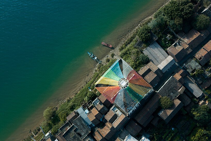 MAD architects wraps abandoned chinese landmark in ethereal veil of multicolored cloth
