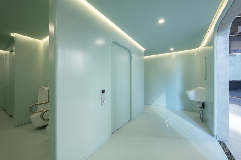 pastel green and overhead lights brighten up marc newson