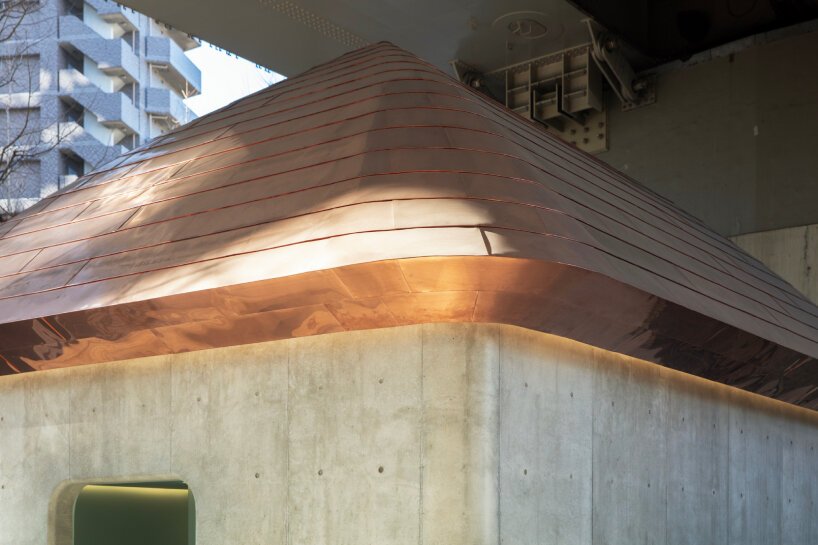 pastel green and overhead lights brighten up marc newson