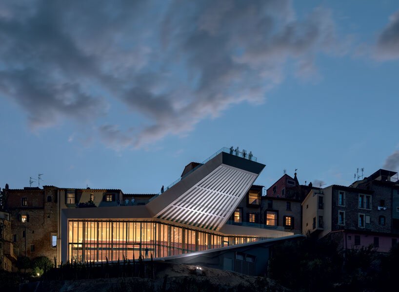 mario cucinella revives an italian hill town with cantilevered cultural center