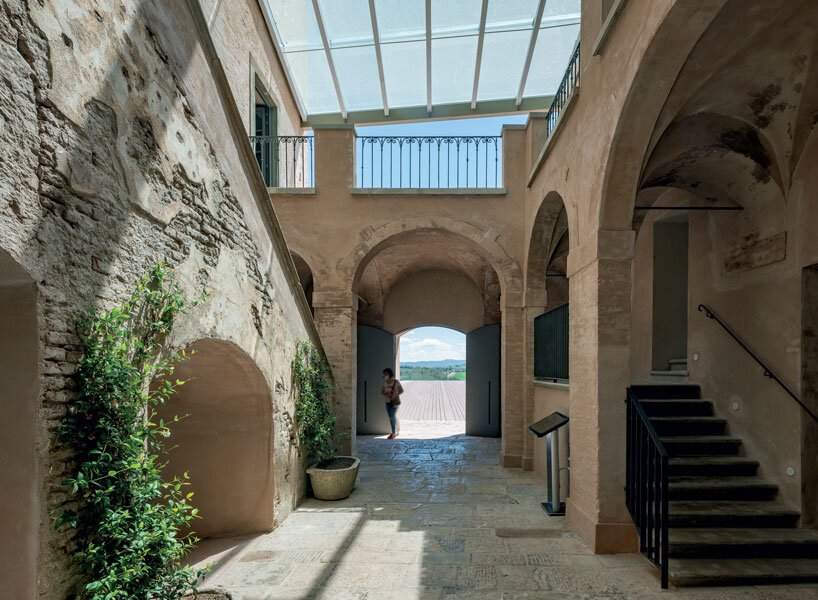 mario cucinella revives an italian hill town with cantilevered cultural center