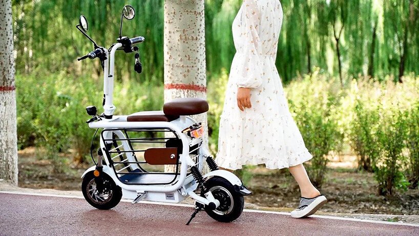 meet mopet: a foldable e-scooter to take your dog for a ride