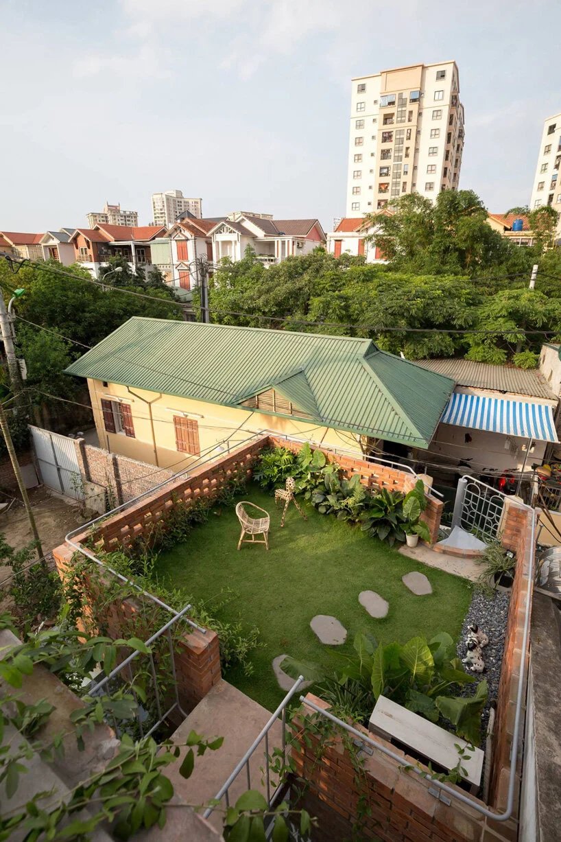 ODDO 建筑事务所将圆窗融入河内 VH 住宅的砖砌外墙