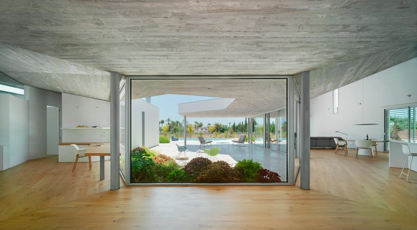 jaime sepulcre arquitecturas 将西班牙房屋布置在一个私密的开放式庭院周围 jaime sepulcre arquitecturas 将西班牙房屋布置在一个私密的开放式庭院周围