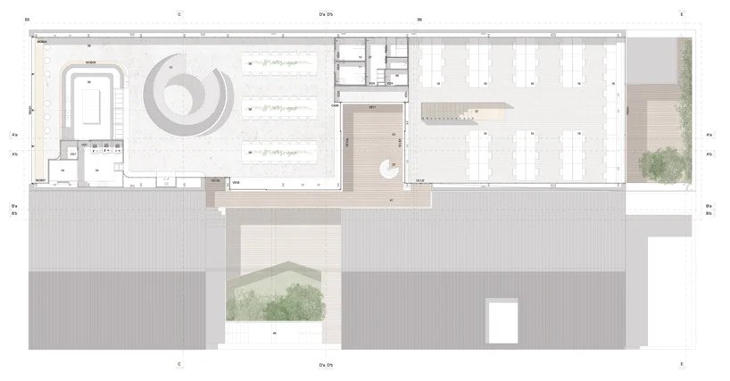 葡萄牙的雕塑螺旋楼梯连接着保罗·梅里尼 (Paulo Merlini) 的仓库改建的办公室