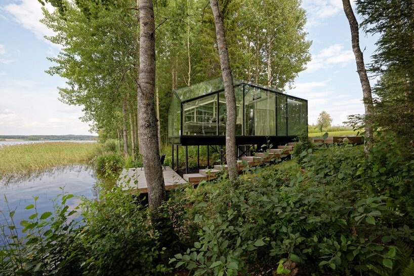 mirrored glass cabin by pirinen & salo disappears into finland