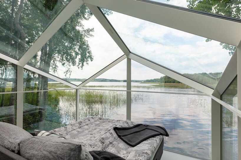 mirrored glass cabin by pirinen & salo disappears into finland