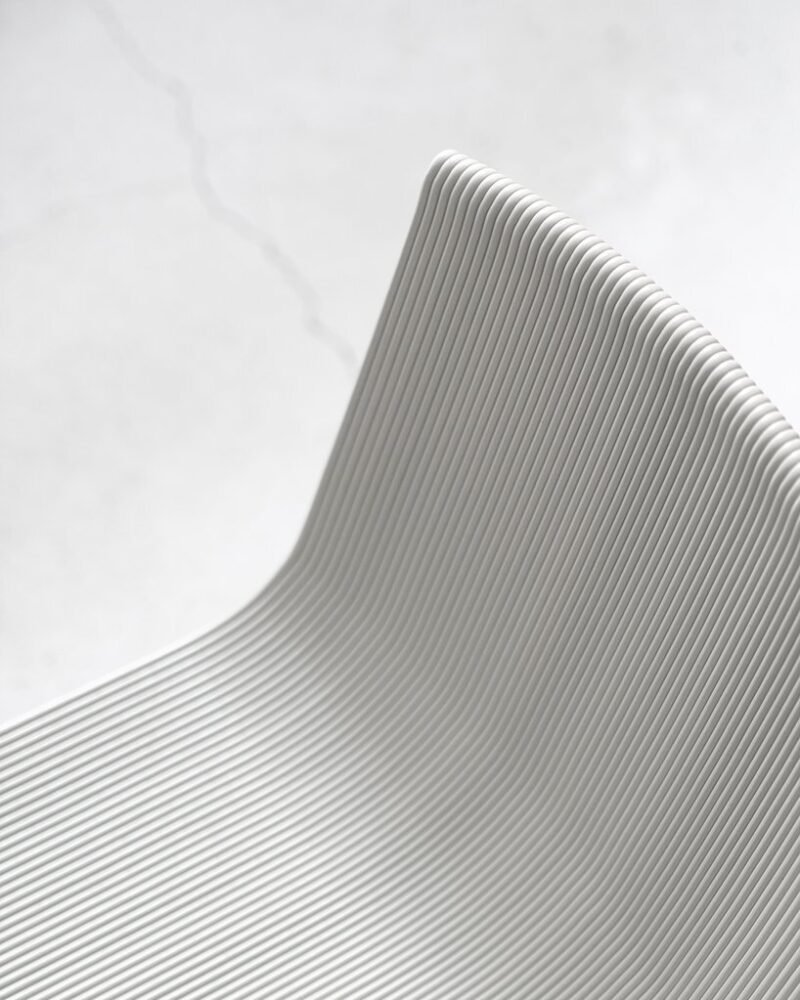 meet rechair, a 3D printed seat made from plastic yogurt cup waste