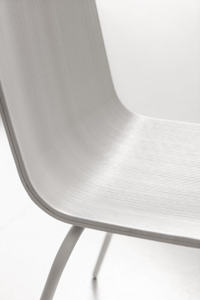 meet rechair, a 3D printed seat made from plastic yogurt cup waste