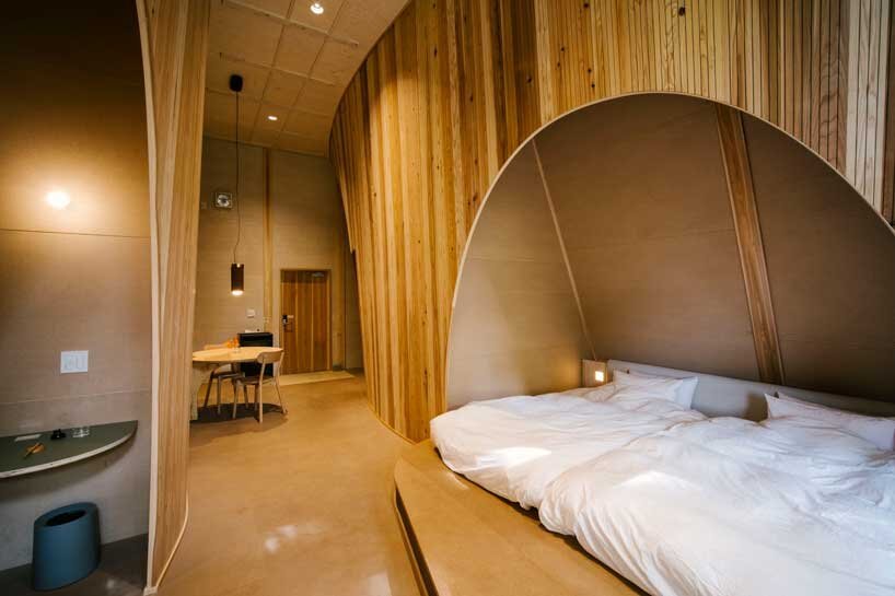 escape the city with SANU’s timber cabins scattered in rural sites across japan