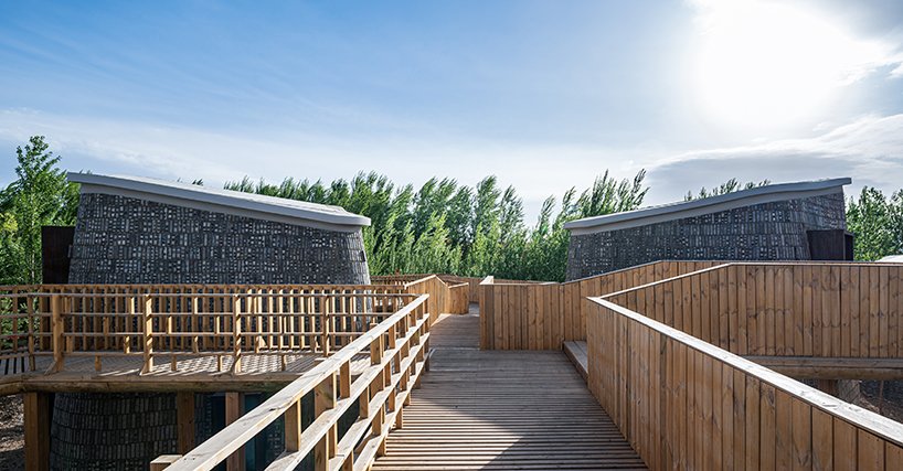 漂浮的木桥网络将中国农村分散的有机形状的“石窟”联合起来