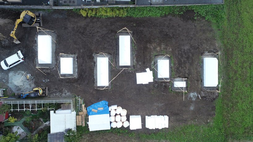 ADX 将挖掘出的土壤转化为日本这座房屋的梯形墙 ADX 将挖掘出的土壤转化为日本这座房屋的梯形墙