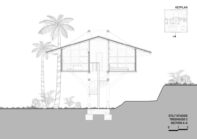 由 Alexis Dornier 设计的高跷工作室 C 木制树屋悬停在巴厘岛盛开的花园上方 由 Alexis Dornier 设计的高跷工作室 C 木制树屋悬停在巴厘岛盛开的花园上方